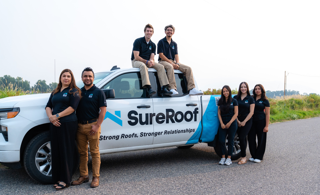 The SureRoof team with their truck in the Gallatin Valley
